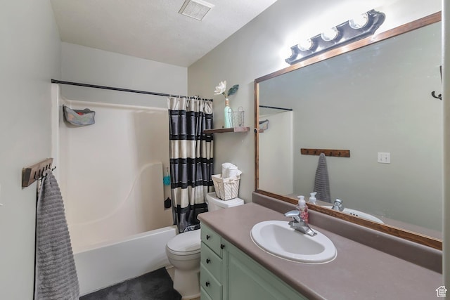 full bathroom with shower / tub combo with curtain, vanity, visible vents, and toilet
