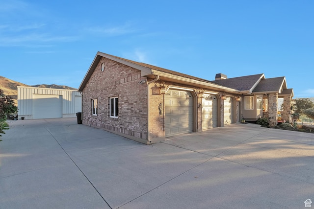 1040 E Canyon Rd, Hyde Park, UT 84318 - view of property exterior featuring a garage