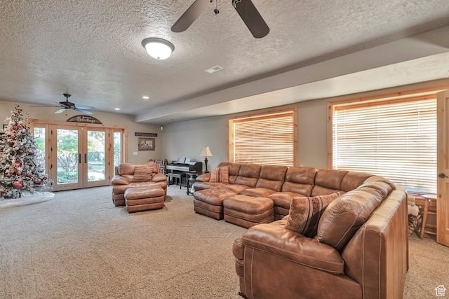 1040 E Canyon Rd, Hyde Park, UT 84318 - living room with french doors, light colored carpet, a textured ceiling, and ceiling fan