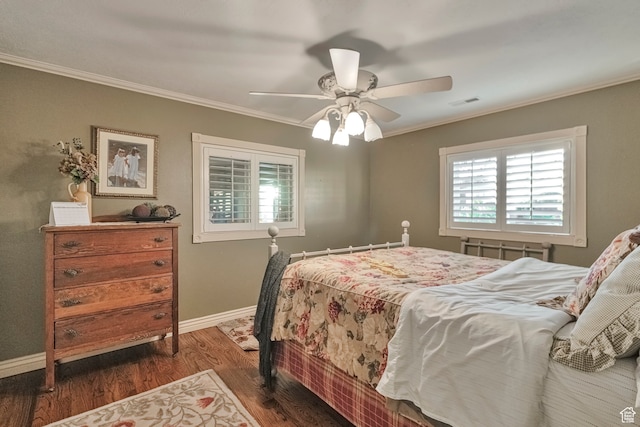 1040 E Canyon Rd, Hyde Park, UT 84318 - bedroom with ceiling fan, dark wood-type flooring, and crown molding