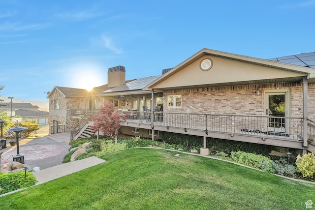 1040 E Canyon Rd, Hyde Park, UT 84318 - back of house with a yard