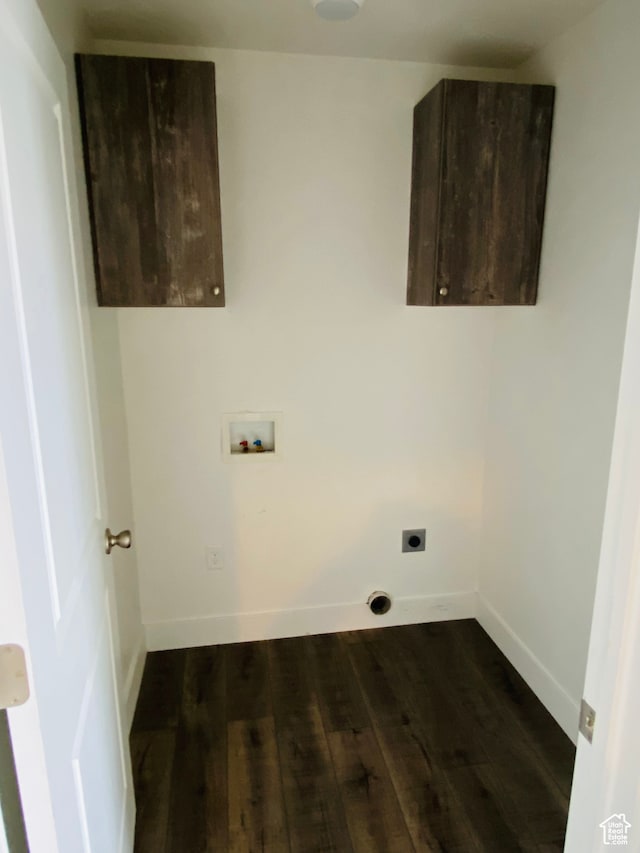 22 E Cedar Ln, Malad City, ID 83252 - clothes washing area with hookup for a washing machine, hookup for an electric dryer, dark wood-type flooring, and cabinets