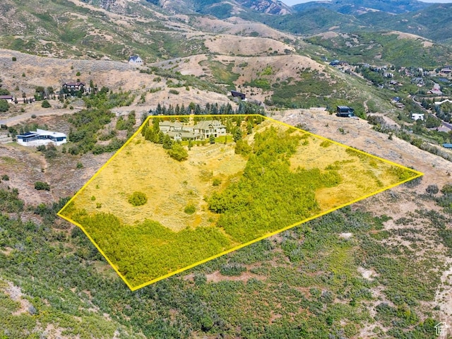 5678 E Twin Creek Rd, Emigration Canyon, UT 84108 - aerial overview of property's location with property parcel outlined and a mountainous background