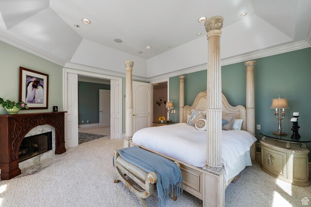 5678 E Twin Creek Rd, Emigration Canyon, UT 84108 - carpeted bedroom with ornate columns, crown molding, recessed lighting, a raised ceiling, and a premium fireplace