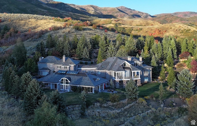 5678 E Twin Creek Rd, Emigration Canyon, UT 84108 - view of subject property featuring a mountain backdrop and a forest