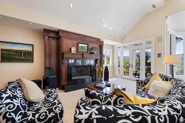 5678 E Twin Creek Rd, Emigration Canyon, UT 84108 - carpeted living room with french doors, a fireplace, recessed lighting, plenty of natural light, and high vaulted ceiling