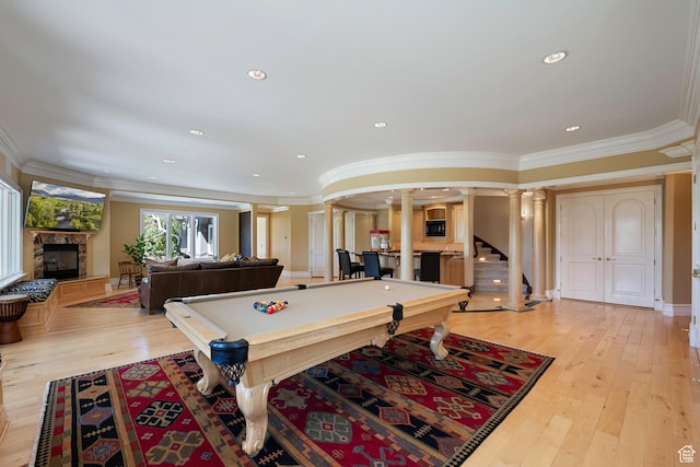 5678 E Twin Creek Rd, Emigration Canyon, UT 84108 - recreation room with decorative columns, billiards, a premium fireplace, ornamental molding, and light wood-type flooring