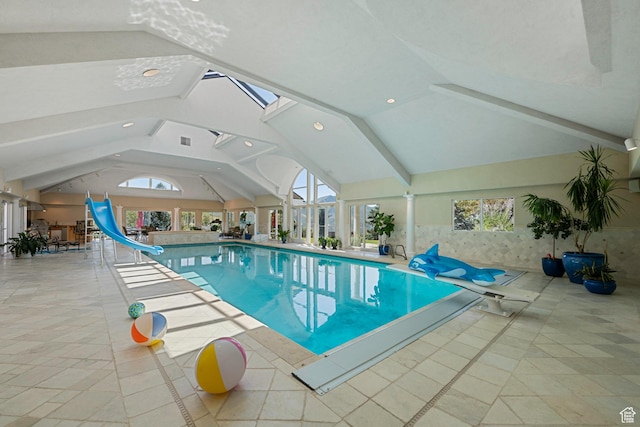 5678 E Twin Creek Rd, Emigration Canyon, UT 84108 - indoor pool featuring a water slide and a skylight