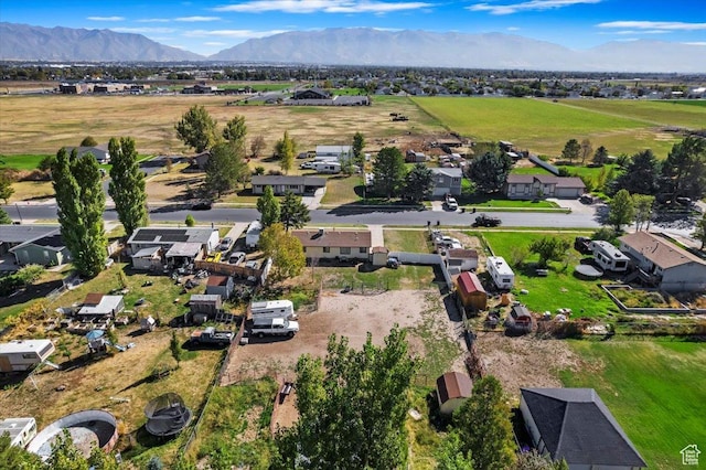 drone / aerial view with a residential view and a mountain view