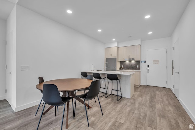 2303 Deer Hollow Rd Unit 1333/4, Park City, UT 84060 - dining space with light wood-style floors, recessed lighting, and baseboards