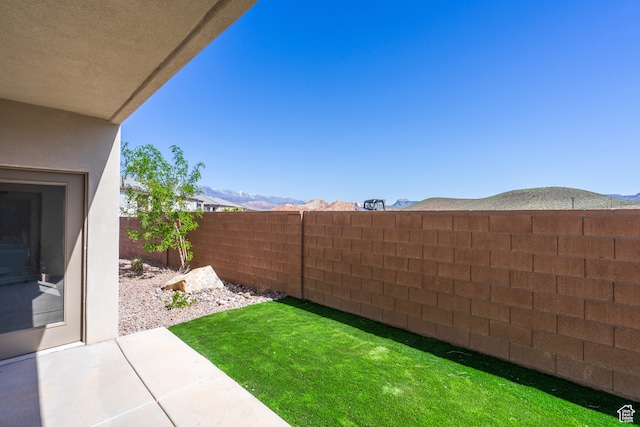 278 N 2020 W, Hurricane, UT 84737 - view of yard featuring a patio area and a mountain view