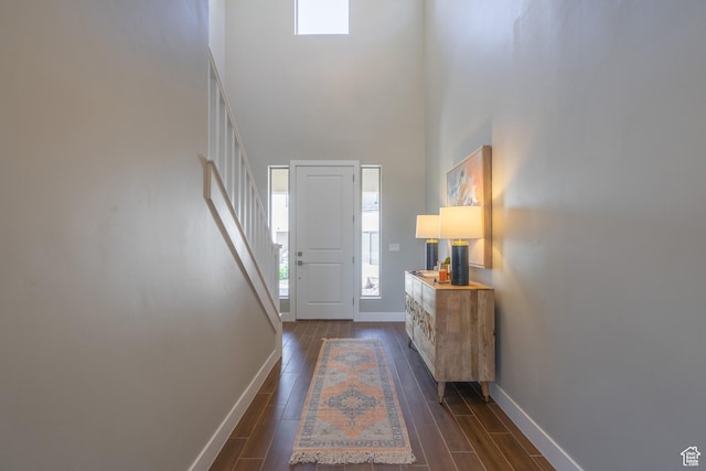 278 N 2020 W, Hurricane, UT 84737 - foyer with healthy amount of natural light, a towering ceiling, wood finish floors, and stairs