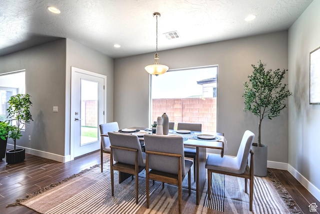 278 N 2020 W, Hurricane, UT 84737 - dining area featuring dark wood-type flooring, recessed lighting, and healthy amount of natural light