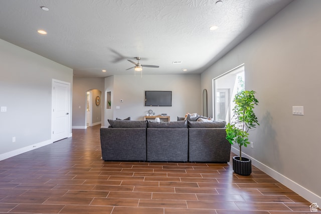 278 N 2020 W, Hurricane, UT 84737 - living room with a textured ceiling, ceiling fan, and dark hardwood / wood-style flooring