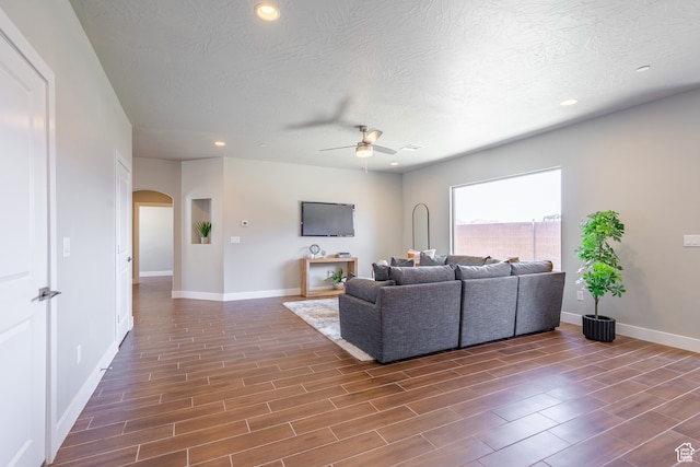 278 N 2020 W, Hurricane, UT 84737 - living room with ceiling fan, a textured ceiling, and dark hardwood / wood-style flooring