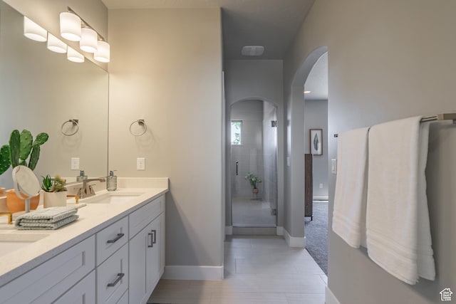 278 N 2020 W, Hurricane, UT 84737 - bathroom featuring double vanity and a stall shower