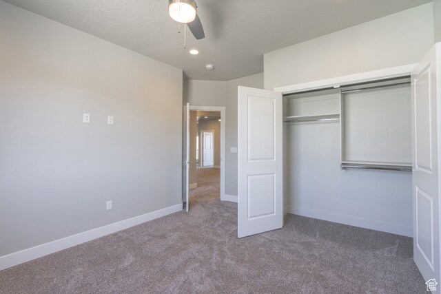 278 N 2020 W, Hurricane, UT 84737 - unfurnished bedroom featuring a textured ceiling, carpet floors, a closet, and ceiling fan