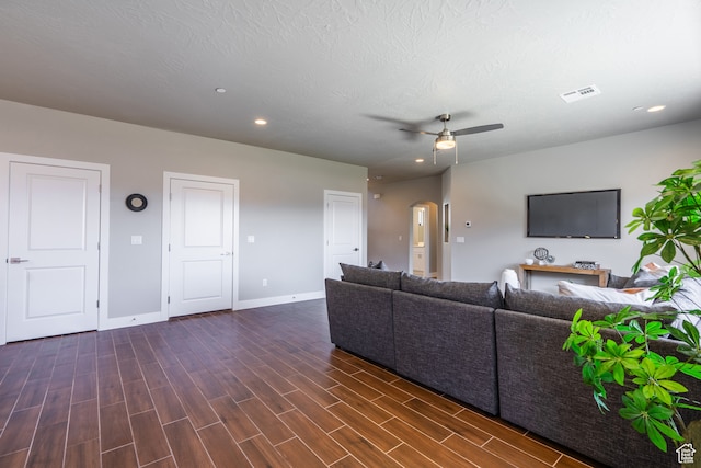 278 N 2020 W, Hurricane, UT 84737 - living room with dark hardwood / wood-style floors, a textured ceiling, and ceiling fan