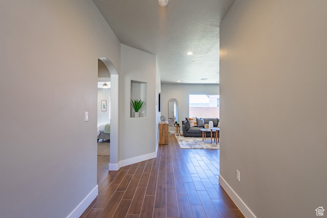 278 N 2020 W, Hurricane, UT 84737 - hallway featuring a textured ceiling and dark hardwood / wood-style flooring