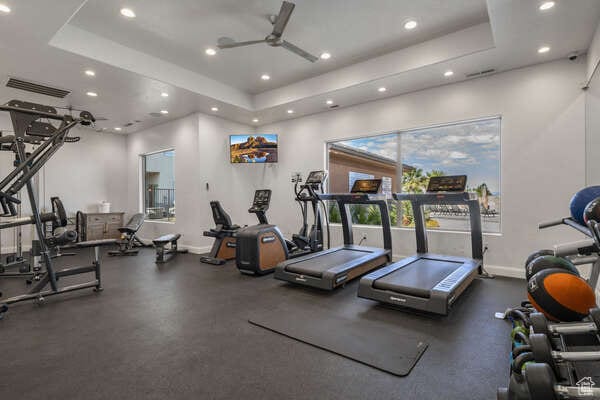 278 N 2020 W, Hurricane, UT 84737 - gym with a wealth of natural light, ceiling fan, and a raised ceiling