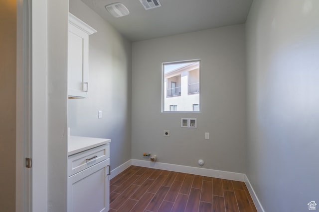 278 N 2020 W, Hurricane, UT 84737 - washroom featuring hookup for a washing machine, hookup for an electric dryer, gas dryer hookup, dark wood-type flooring, and cabinets