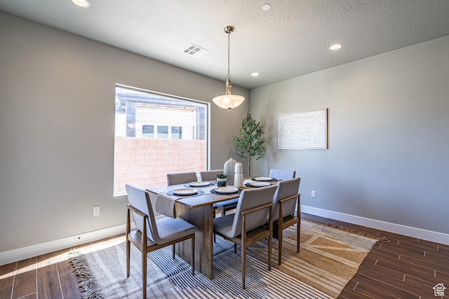 278 N 2020 W, Hurricane, UT 84737 - dining area featuring a textured ceiling and dark hardwood / wood-style flooring