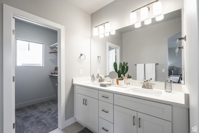278 N 2020 W, Hurricane, UT 84737 - ensuite bathroom featuring double vanity and baseboards