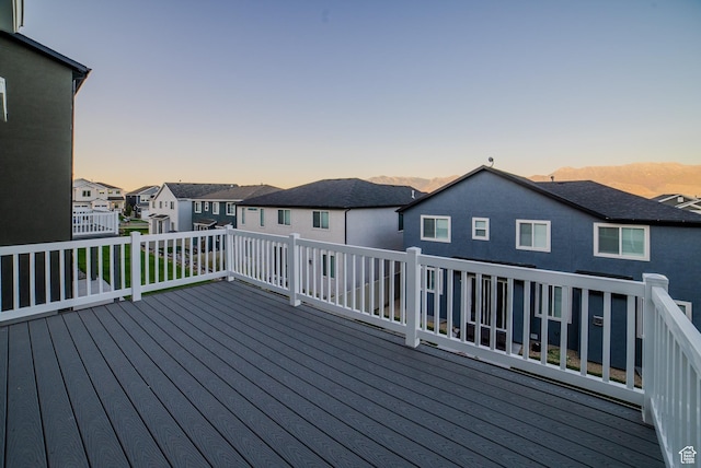 wooden deck featuring a residential view