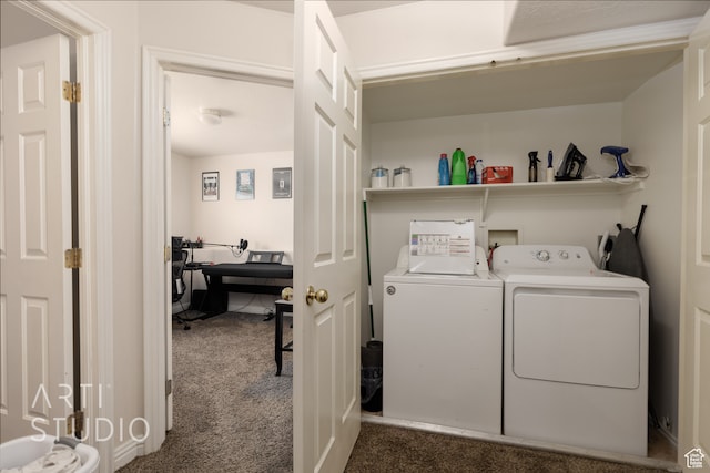 laundry room featuring separate washer and dryer and dark colored carpet