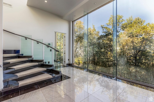3809 E Thousand Oaks Cir, Salt Lake City, UT 84124 - stairs featuring floor to ceiling windows