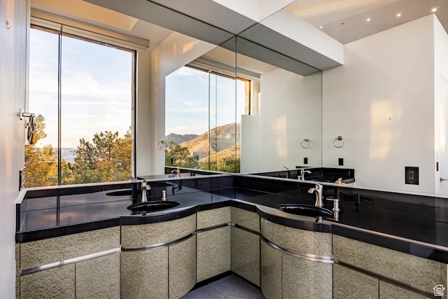 3809 E Thousand Oaks Cir, Salt Lake City, UT 84124 - bathroom with double vanity, recessed lighting, and a mountain view