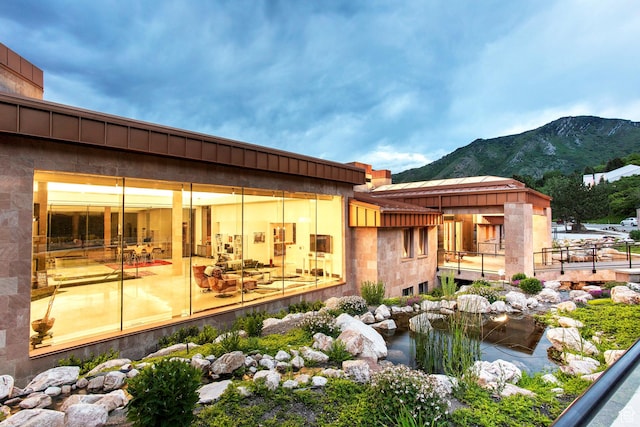 3809 E Thousand Oaks Cir, Salt Lake City, UT 84124 - back of property featuring a mountain view and a small pond