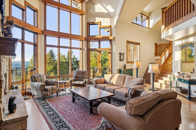 75 Hidden Oaks Ln, Park City, UT 84060 - living area featuring a towering ceiling, stairs, french doors, and wood finished floors