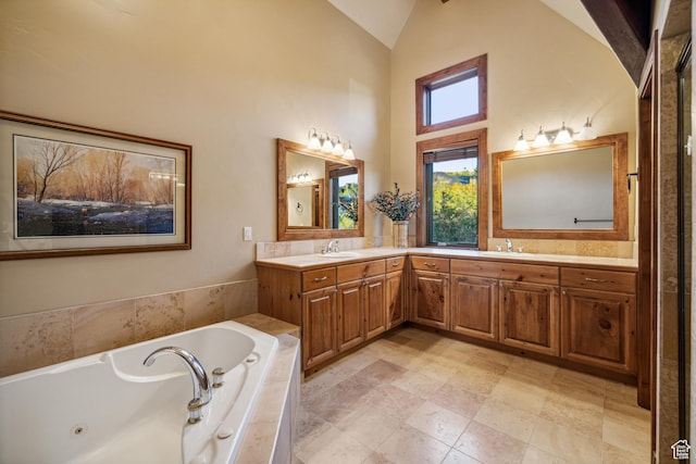 75 Hidden Oaks Ln, Park City, UT 84060 - full bath with double vanity, high vaulted ceiling, a jetted tub, and a sink