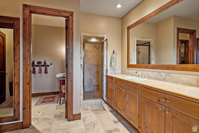 75 Hidden Oaks Ln, Park City, UT 84060 - bathroom featuring a stall shower, vanity, and baseboards