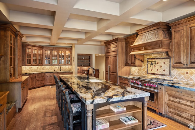 75 Hidden Oaks Ln, Park City, UT 84060 - kitchen with tasteful backsplash, open shelves, a sink, premium appliances, and light stone countertops