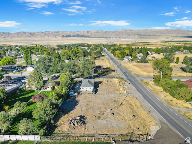 drone / aerial view featuring a mountain view
