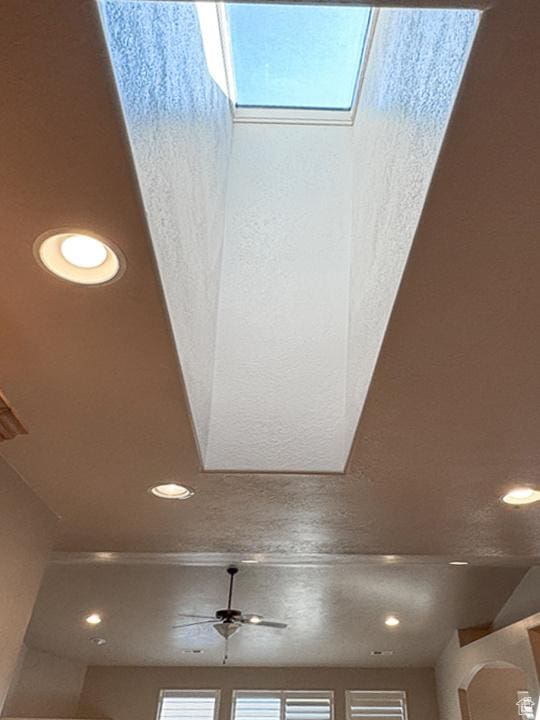 interior details featuring recessed lighting and ceiling fan