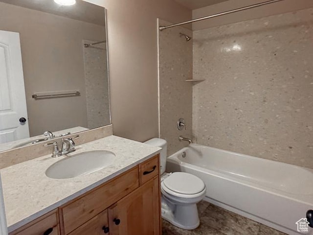 full bathroom featuring shower / bath combination, vanity, and toilet
