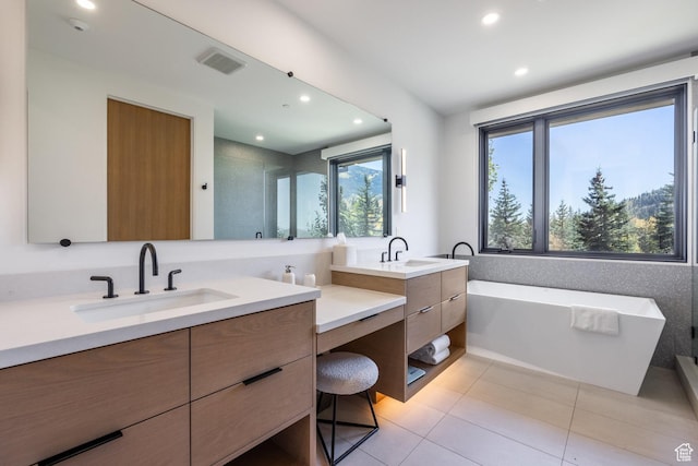 3576 Ridgeline Dr Unit 14-C, Park City, UT 84098 - full bath featuring tile patterned flooring, recessed lighting, two vanities, and a soaking tub