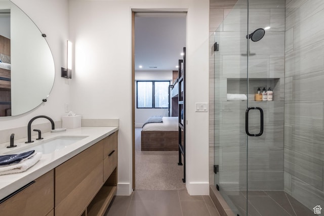 3576 Ridgeline Dr Unit 14-C, Park City, UT 84098 - bathroom with connected bathroom, tile patterned floors, vanity, a shower stall, and baseboards