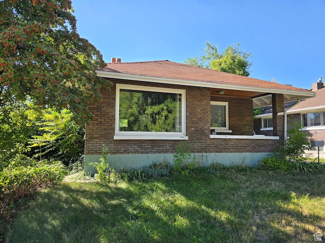 379 N 500 E, Provo, UT 84606 - view of side of property featuring a yard and brick siding