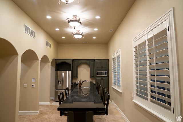 dining area featuring visible vents, baseboards, and recessed lighting