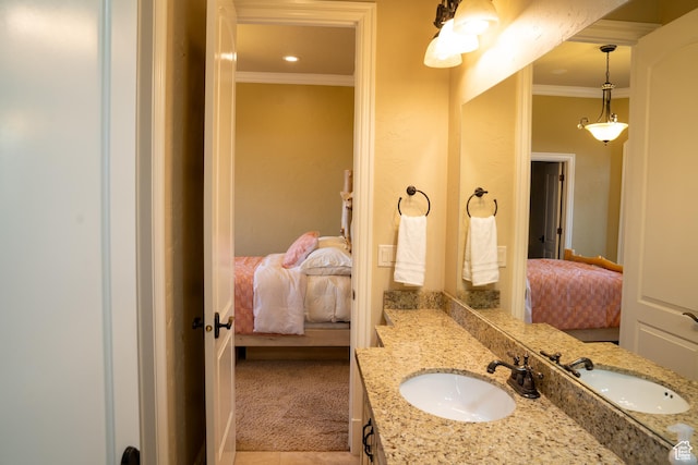 full bath featuring ensuite bathroom, ornamental molding, and vanity