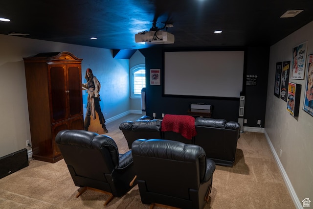 home theater room featuring light carpet, baseboards, visible vents, and recessed lighting
