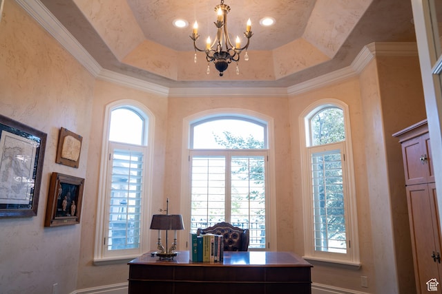 office with a tray ceiling and a chandelier