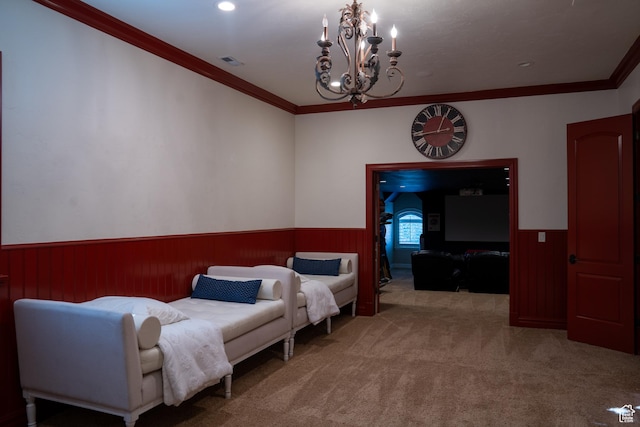 carpeted bedroom featuring a chandelier, crown molding, wainscoting, and visible vents