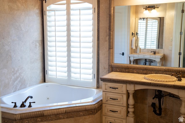 full bathroom featuring a tub with jets