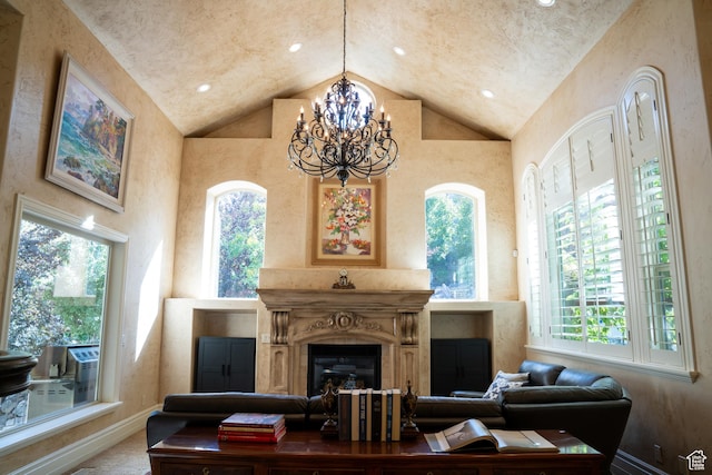 living area with baseboards and plenty of natural light