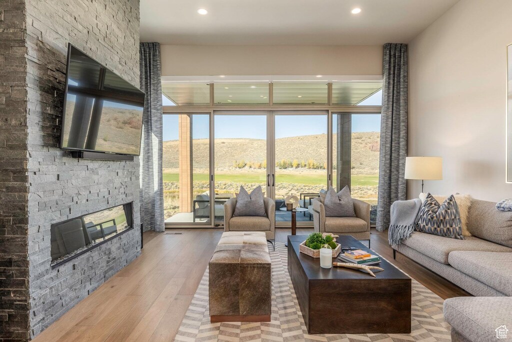 6342 Double Deer Loop, Park City, UT 84098 - living room with wood finished floors, a fireplace, and recessed lighting